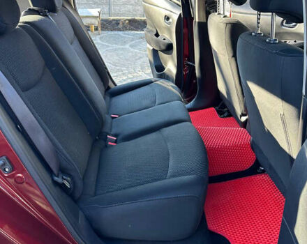 Красный Ниссан Лиф, объемом двигателя 0 л и пробегом 99 тыс. км за 7500 $, фото 30 на Automoto.ua