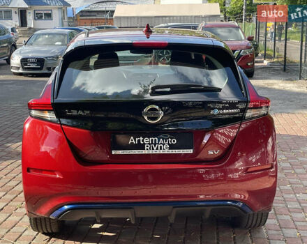 Красный Ниссан Лиф, объемом двигателя 0 л и пробегом 117 тыс. км за 12000 $, фото 3 на Automoto.ua