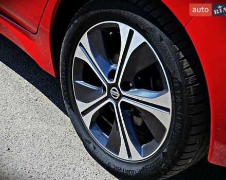 Красный Ниссан Лиф, объемом двигателя 0 л и пробегом 93 тыс. км за 15300 $, фото 4 на Automoto.ua