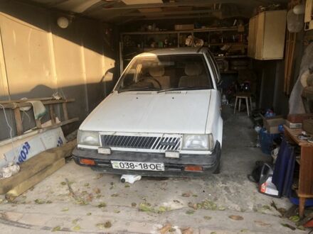Білий Ніссан Марч, об'ємом двигуна 1 л та пробігом 250 тис. км за 243 $, фото 1 на Automoto.ua