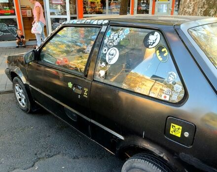 Черный Ниссан Марч, объемом двигателя 1 л и пробегом 200 тыс. км за 500 $, фото 2 на Automoto.ua