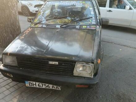 Чорний Ніссан Марч, об'ємом двигуна 1 л та пробігом 200 тис. км за 500 $, фото 1 на Automoto.ua