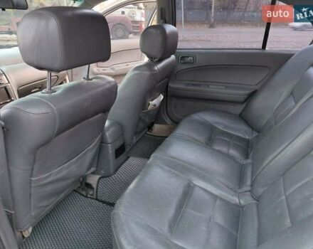 Белый Ниссан Максима, объемом двигателя 3 л и пробегом 454 тыс. км за 3100 $, фото 16 на Automoto.ua