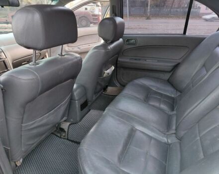 Белый Ниссан Максима, объемом двигателя 3 л и пробегом 454 тыс. км за 3100 $, фото 10 на Automoto.ua