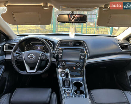 Белый Ниссан Максима, объемом двигателя 3.5 л и пробегом 207 тыс. км за 13700 $, фото 6 на Automoto.ua