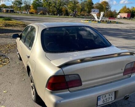 Бежевый Ниссан Максима, объемом двигателя 3 л и пробегом 400 тыс. км за 1900 $, фото 1 на Automoto.ua