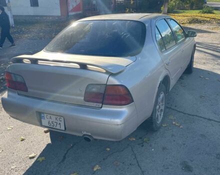 Бежевый Ниссан Максима, объемом двигателя 3 л и пробегом 400 тыс. км за 1900 $, фото 3 на Automoto.ua