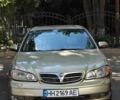 Бежевий Ніссан Максіма, об'ємом двигуна 2 л та пробігом 357 тис. км за 1999 $, фото 1 на Automoto.ua