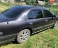 Черный Ниссан Максима, объемом двигателя 2 л и пробегом 300 тыс. км за 1000 $, фото 1 на Automoto.ua