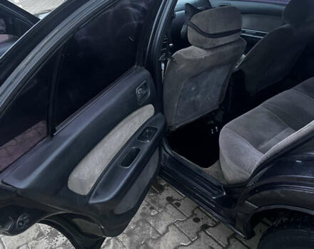 Черный Ниссан Максима, объемом двигателя 2 л и пробегом 450 тыс. км за 2250 $, фото 4 на Automoto.ua