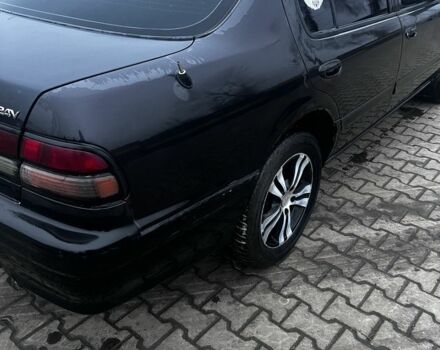 Черный Ниссан Максима, объемом двигателя 2 л и пробегом 450 тыс. км за 2250 $, фото 3 на Automoto.ua