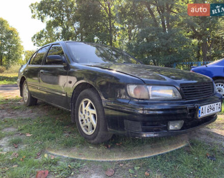 Черный Ниссан Максима, объемом двигателя 2.99 л и пробегом 300 тыс. км за 2450 $, фото 1 на Automoto.ua