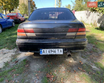 Черный Ниссан Максима, объемом двигателя 2.99 л и пробегом 300 тыс. км за 2450 $, фото 5 на Automoto.ua