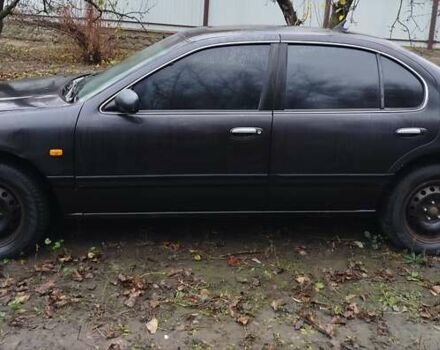 Черный Ниссан Максима, объемом двигателя 2 л и пробегом 34 тыс. км за 1650 $, фото 2 на Automoto.ua