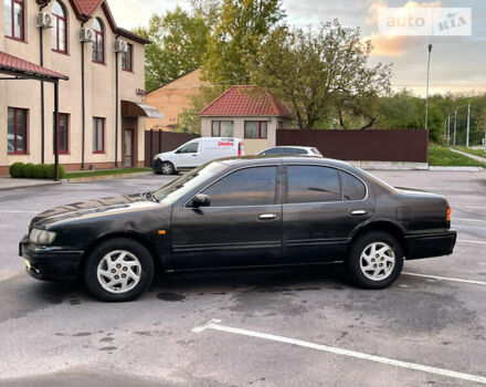 Чорний Ніссан Максіма, об'ємом двигуна 0 л та пробігом 300 тис. км за 1999 $, фото 3 на Automoto.ua