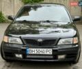 Черный Ниссан Максима, объемом двигателя 2 л и пробегом 302 тыс. км за 1999 $, фото 6 на Automoto.ua