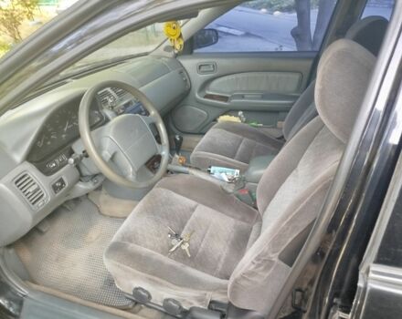 Черный Ниссан Максима, объемом двигателя 3 л и пробегом 403 тыс. км за 2500 $, фото 1 на Automoto.ua