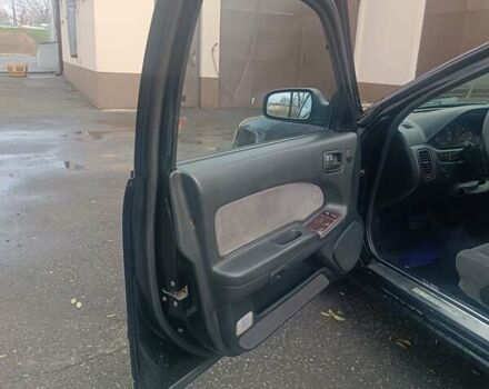 Черный Ниссан Максима, объемом двигателя 2 л и пробегом 291 тыс. км за 2850 $, фото 8 на Automoto.ua