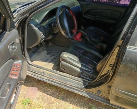 Чорний Ніссан Максіма, об'ємом двигуна 2 л та пробігом 416 тис. км за 1800 $, фото 5 на Automoto.ua