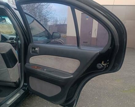 Черный Ниссан Максима, объемом двигателя 2 л и пробегом 291 тыс. км за 2850 $, фото 10 на Automoto.ua