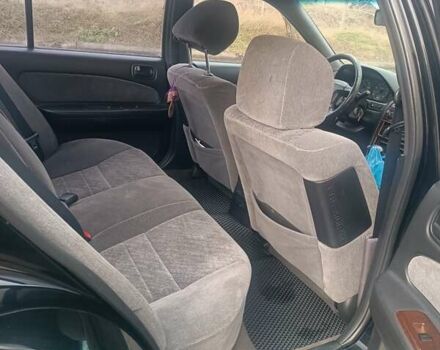 Черный Ниссан Максима, объемом двигателя 2 л и пробегом 291 тыс. км за 2850 $, фото 14 на Automoto.ua