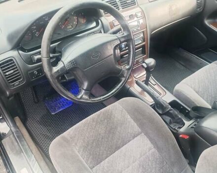 Черный Ниссан Максима, объемом двигателя 2 л и пробегом 291 тыс. км за 2850 $, фото 9 на Automoto.ua