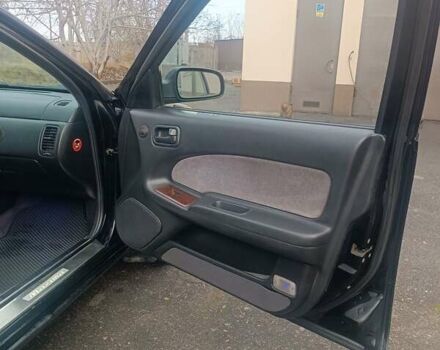 Черный Ниссан Максима, объемом двигателя 2 л и пробегом 291 тыс. км за 2850 $, фото 11 на Automoto.ua