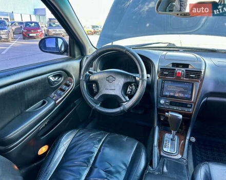 Черный Ниссан Максима, объемом двигателя 2.99 л и пробегом 250 тыс. км за 4200 $, фото 18 на Automoto.ua