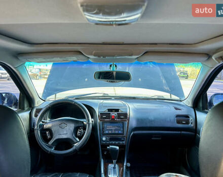 Черный Ниссан Максима, объемом двигателя 2.99 л и пробегом 250 тыс. км за 4200 $, фото 21 на Automoto.ua