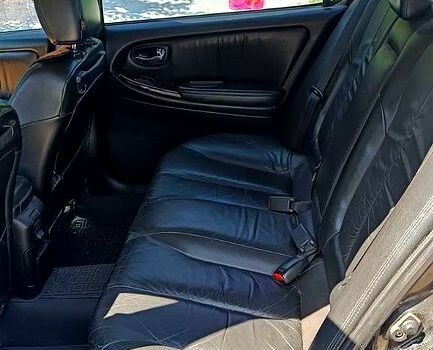 Чорний Ніссан Максіма, об'ємом двигуна 3 л та пробігом 342 тис. км за 4150 $, фото 5 на Automoto.ua