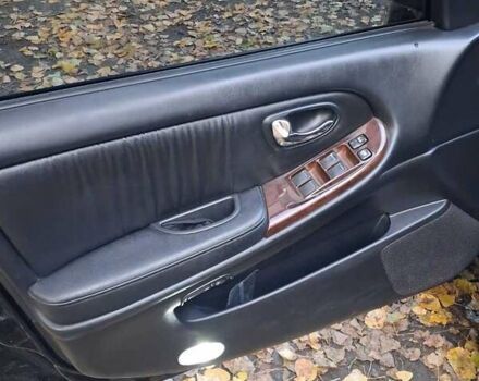 Черный Ниссан Максима, объемом двигателя 2 л и пробегом 310 тыс. км за 3500 $, фото 13 на Automoto.ua