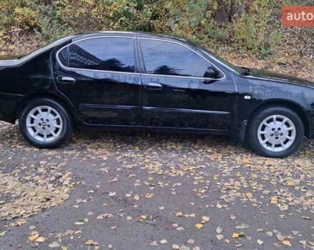 Черный Ниссан Максима, объемом двигателя 2 л и пробегом 310 тыс. км за 3500 $, фото 5 на Automoto.ua