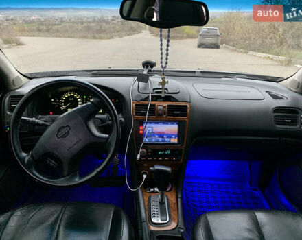 Черный Ниссан Максима, объемом двигателя 2 л и пробегом 258 тыс. км за 4500 $, фото 10 на Automoto.ua