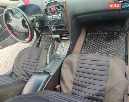 Чорний Ніссан Максіма, об'ємом двигуна 3 л та пробігом 340 тис. км за 1800 $, фото 12 на Automoto.ua