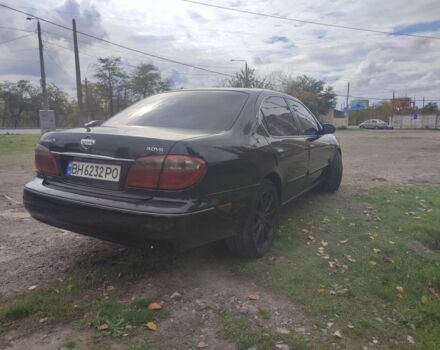 Черный Ниссан Максима, объемом двигателя 3 л и пробегом 300 тыс. км за 3450 $, фото 7 на Automoto.ua