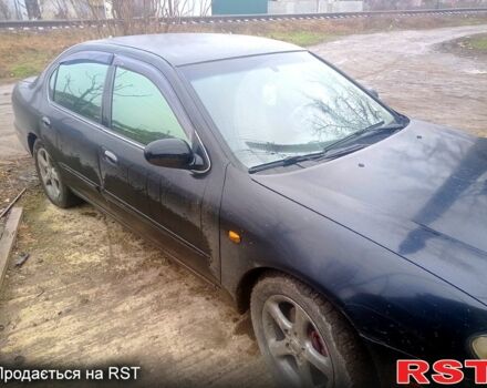 Чорний Ніссан Максіма, об'ємом двигуна 3 л та пробігом 312 тис. км за 2400 $, фото 4 на Automoto.ua