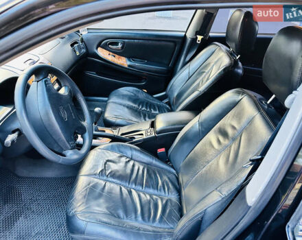 Черный Ниссан Максима, объемом двигателя 2 л и пробегом 197 тыс. км за 5400 $, фото 17 на Automoto.ua