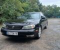 Чорний Ніссан Максіма, об'ємом двигуна 2 л та пробігом 409 тис. км за 2000 $, фото 1 на Automoto.ua