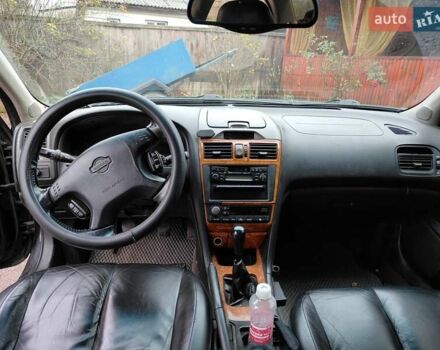 Черный Ниссан Максима, объемом двигателя 3 л и пробегом 320 тыс. км за 3500 $, фото 3 на Automoto.ua