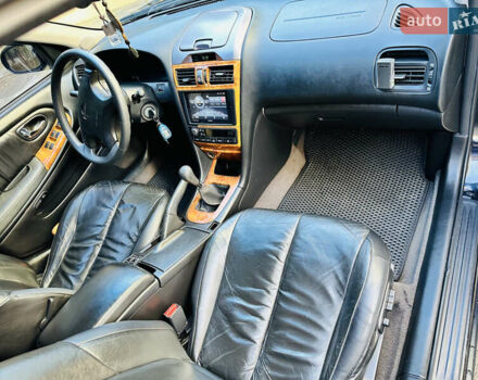 Черный Ниссан Максима, объемом двигателя 2 л и пробегом 197 тыс. км за 5400 $, фото 27 на Automoto.ua