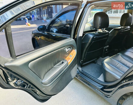 Черный Ниссан Максима, объемом двигателя 2 л и пробегом 197 тыс. км за 5400 $, фото 22 на Automoto.ua