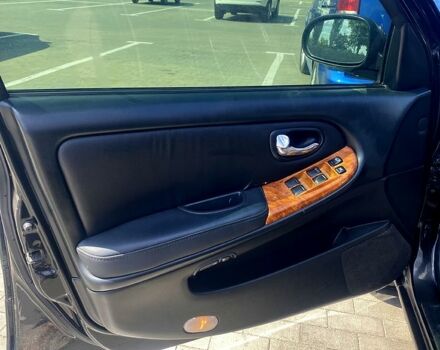 Черный Ниссан Максима, объемом двигателя 2 л и пробегом 160 тыс. км за 3600 $, фото 5 на Automoto.ua