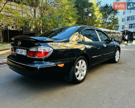 Черный Ниссан Максима, объемом двигателя 2 л и пробегом 197 тыс. км за 5400 $, фото 12 на Automoto.ua