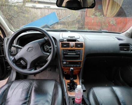 Черный Ниссан Максима, объемом двигателя 3 л и пробегом 320 тыс. км за 3500 $, фото 6 на Automoto.ua