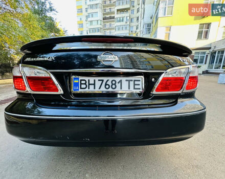 Черный Ниссан Максима, объемом двигателя 2 л и пробегом 197 тыс. км за 5400 $, фото 13 на Automoto.ua