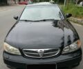 Черный Ниссан Максима, объемом двигателя 2 л и пробегом 230 тыс. км за 5000 $, фото 1 на Automoto.ua