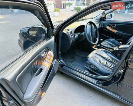 Черный Ниссан Максима, объемом двигателя 2 л и пробегом 197 тыс. км за 5400 $, фото 16 на Automoto.ua