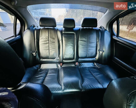 Черный Ниссан Максима, объемом двигателя 2 л и пробегом 197 тыс. км за 5400 $, фото 43 на Automoto.ua