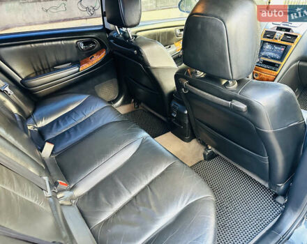 Черный Ниссан Максима, объемом двигателя 2 л и пробегом 197 тыс. км за 5400 $, фото 26 на Automoto.ua