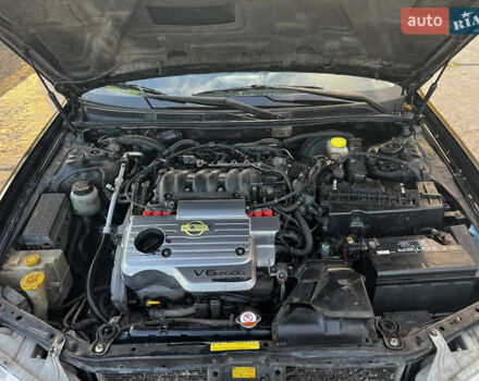 Черный Ниссан Максима, объемом двигателя 2 л и пробегом 300 тыс. км за 3300 $, фото 11 на Automoto.ua